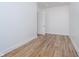 Modern bedroom featuring vinyl plank flooring and white walls with natural light at 15 W Executive Dr # 104, Carmel, IN 46032
