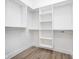 Spacious walk-in closet with custom shelving and ample storage space at 15 W Executive Dr # 104, Carmel, IN 46032