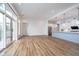 Open concept living space with modern finishes, kitchen, and a balcony at 15 W Executive Dr # 104, Carmel, IN 46032