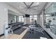 Well-equipped weight room with racks of dumbbells, weight machines, benches, and large mirrors at 15 W Executive Dr # 104, Carmel, IN 46032