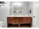 Elegant bathroom showcasing a double vanity with sleek fixtures and a neutral color scheme at 1852 W 62Nd St, Indianapolis, IN 46260