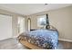 Comfortable bedroom with vinyl floor, closet, and ample natural light at 1852 W 62Nd St, Indianapolis, IN 46260