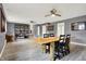 Open living room with modern flooring, unique wooden table, and contemporary decor at 1852 W 62Nd St, Indianapolis, IN 46260