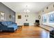 Beautiful living room features a large bay window and hardwood flooring at 1852 W 62Nd St, Indianapolis, IN 46260