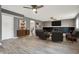 Spacious living room with modern fireplace, neutral gray walls, and stylish furnishings at 1852 W 62Nd St, Indianapolis, IN 46260