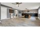 Stylish living room with light floors, fireplace, and modern design elements at 1852 W 62Nd St, Indianapolis, IN 46260