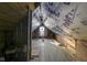 Attic space with visible framing and natural light at 2312 Fletcher St, Anderson, IN 46016