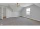 Bright bedroom features contemporary lighting and large windows at 2312 Fletcher St, Anderson, IN 46016