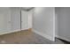 Neutral bedroom with modern grey walls, neutral carpet, and bright white trim at 2312 Fletcher St, Anderson, IN 46016