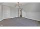 Bedroom with neutral walls, carpet, modern lighting and convenient access to other rooms at 2312 Fletcher St, Anderson, IN 46016