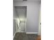 Bright hallway with carpeted stairs leading to the upper level at 2312 Fletcher St, Anderson, IN 46016