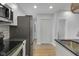 Bright eat-in kitchen with stainless steel appliances, modern cabinetry, and attractive countertops at 2312 Fletcher St, Anderson, IN 46016