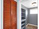 Walk-in closet with shelving and storage space adjacent to room at 26 Highland Ave, Franklin, IN 46131