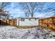 A shed with white siding and a gated entrance at 26 Highland Ave, Franklin, IN 46131
