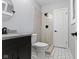 Bathroom featuring hexagonal tiles and shower at 3645 Glencairn Ln, Indianapolis, IN 46205