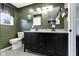 Bathroom features double vanity, updated fixtures, and neutral color palette at 3645 Glencairn Ln, Indianapolis, IN 46205