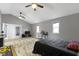 Primary bedroom showcases a vaulted ceiling, natural light, and ensuite bathroom access at 3645 Glencairn Ln, Indianapolis, IN 46205