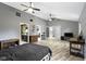Spacious primary bedroom features plenty of square footage and easy access to ensuite and closets at 3645 Glencairn Ln, Indianapolis, IN 46205