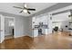 Open-concept living room showcases hardwood floors and seamless flow into the updated kitchen at 3645 Glencairn Ln, Indianapolis, IN 46205