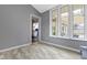 Additional living space with durable flooring, natural light, and easy kitchen access at 3645 Glencairn Ln, Indianapolis, IN 46205