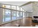 Living room featuring a wall of windows leading to the backyard at 3645 Glencairn Ln, Indianapolis, IN 46205