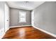 Comfortable bedroom with hardwood floors and two closets at 3708 Rockville Rd, Indianapolis, IN 46222