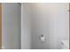 Bathroom featuring a toilet paper holder, toilet and enclosed shower with white tile at 4018 S State Road 75, Coatesville, IN 46121