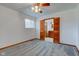 Bedroom with carpet, ceiling fan and ensuite access at 4018 S State Road 75, Coatesville, IN 46121