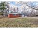 Charming single story brick home featuring a front yard, garage and gravel driveway at 4018 S State Road 75, Coatesville, IN 46121