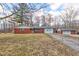 Charming single story brick home featuring a front yard, garage and gravel driveway at 4018 S State Road 75, Coatesville, IN 46121
