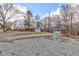 Charming single story brick home featuring a detached garage and gravel driveway at 4018 S State Road 75, Coatesville, IN 46121