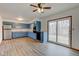 Spacious kitchen with stainless appliances, hardwood floors and sliding glass doors at 4018 S State Road 75, Coatesville, IN 46121