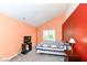 Comfortable bedroom with patterned quilt, window views, and a TV set on a stand at 5142 Pin Oak Dr, Indianapolis, IN 46254