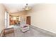 Open living room featuring a ceiling fan and views of the connected kitchen and dining area at 5142 Pin Oak Dr, Indianapolis, IN 46254