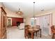 Open-concept living room with a dining area featuring high ceilings and great light at 5142 Pin Oak Dr, Indianapolis, IN 46254