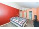 Comfortable bedroom with colorful walls, offering two closets and an attached bathroom at 5142 Pin Oak Dr, Indianapolis, IN 46254