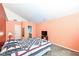 Spacious primary bedroom with high ceilings, soft carpet, and access to an ensuite bathroom at 5142 Pin Oak Dr, Indianapolis, IN 46254