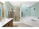 Bathroom featuring a large soaking tub with jets, a vanity, and a shower at 5272 N Graham Rd, Whiteland, IN 46184