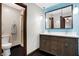 Modern bathroom with double sink vanity, mirror, and tiled walk-in shower at 5272 N Graham Rd, Whiteland, IN 46184