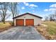 Detached two car garage with an asphalt driveway at 5272 N Graham Rd, Whiteland, IN 46184