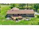 Aerial view of a home with a wooden deck and sliding glass doors to the backyard at 5272 N Graham Rd, Whiteland, IN 46184