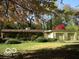 Charming one-story home featuring a two-car garage and mature landscaping at 5506 N Drexel Ave, Indianapolis, IN 46220