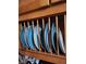 View of wooden kitchen cabinets showcasing blue plates at 5506 N Drexel Ave, Indianapolis, IN 46220
