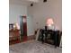 Bright living room with wood floors and a decorated console table creates an inviting space at 5506 N Drexel Ave, Indianapolis, IN 46220