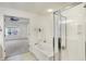 Bathroom featuring tub with shower and vanity with view of the bedroom at 660 Overcup St, Westfield, IN 46074