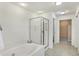 Bright bathroom featuring walk-in shower and soaking tub at 660 Overcup St, Westfield, IN 46074