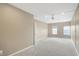 Neutral carpeted bedroom with two windows and ample open space at 660 Overcup St, Westfield, IN 46074