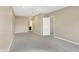 Spacious bedroom with neutral tones, plush carpet, and ceiling fan at 660 Overcup St, Westfield, IN 46074
