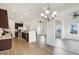 Modern kitchen with stainless steel appliances, hardwood floors, and an open layout at 660 Overcup St, Westfield, IN 46074
