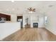 Great room featuring hardwood floors, a gas fireplace and stainless steel appliances at 660 Overcup St, Westfield, IN 46074